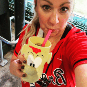 Erica Simpson try hard to be pretty at an Atlanta Braves game