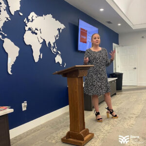 erica simpson speaking at an event