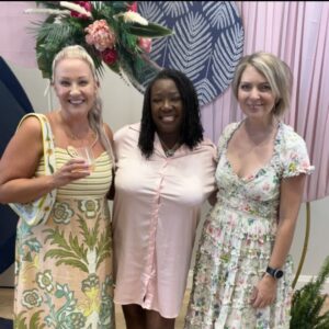 erica simpson with colleagues at an event