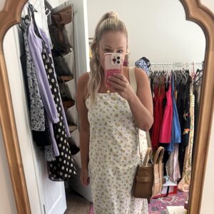 erica simpson in a yellow and white floral linen dress